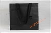 高档黑色字母铜版纸袋